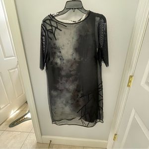 T Tahari size 12.  Sleeves shift with light weight over dress.
